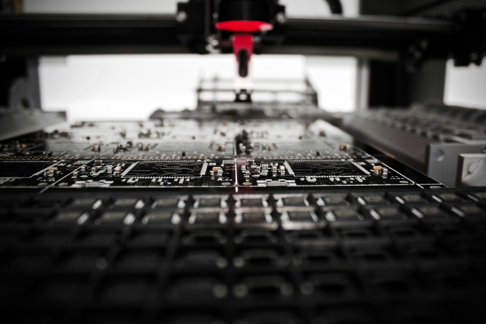 Electronics assembly line placing components on a circuit board